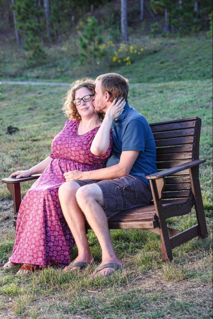 couple sitting at a bench